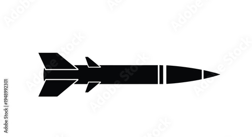 Black silhouette of a guided missile with stabilizing fins side view