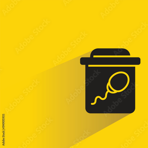 sperm bottle with shadow on yellow background