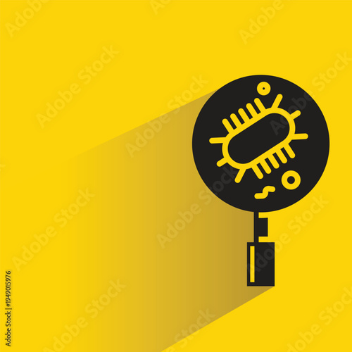 bacteria and magnifier icon with shadow on yellow background