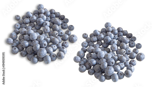 Two iles of blueberries, one with shadows, isolated on a transparent background