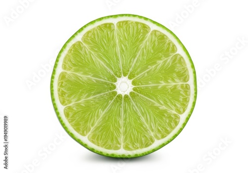 A green lime cut in half on a white background