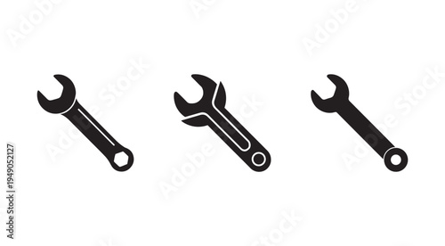 Three black wrenches on white background for repair and construction  tools for fixing and building