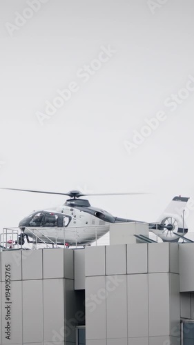 TV helicopter with a camera attached for filming and military surveillance taking off