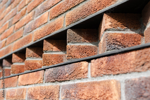 Photos Contemporary clinker brickwork featuring decorative openings and unique architectural texture