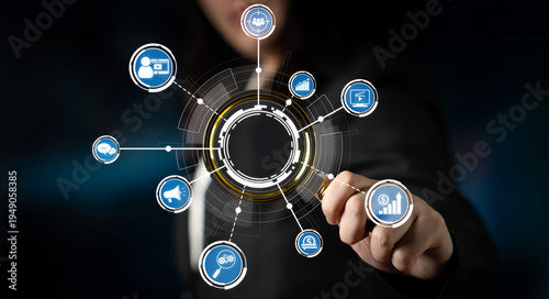 Canvastavla This image depicts a professional hand interacting with futuristic digital icons representing analytics, technology, and data growth, highlighting modern business insights