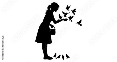 A silhouette of a girl releasing birds into the open sky