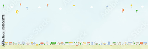 水彩風のかわいい街並み背景イラスト 空にコピースペースのある横長デザイン