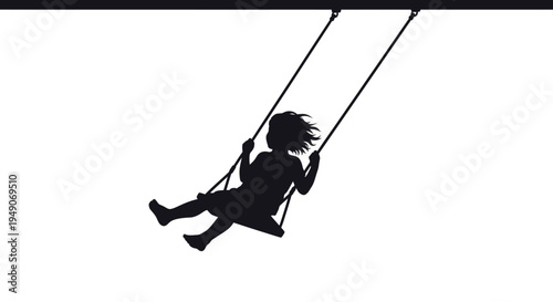 Silhouette of happy child swinging on a playground swing