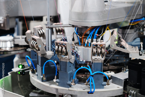 industrial machine for braiding belts, braids, and cords with numerous precision components. Ideal for production and automation.