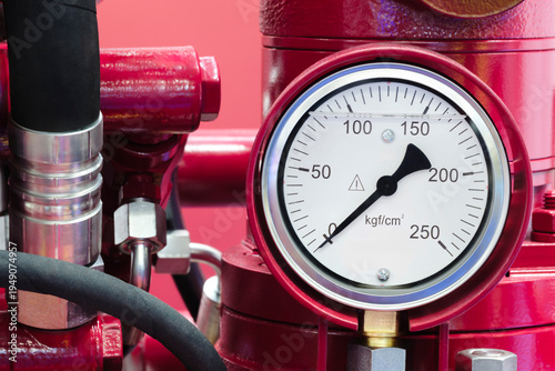 Canvas Print Red fire pump with pressure gauge
