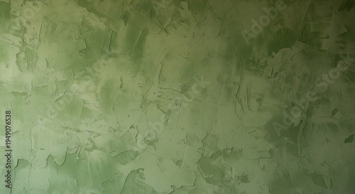 An abstract view of a wall with visible brushstrokes and palette knife marks in various shades of green. The finish has a Venetian plaster or artistic concrete look.