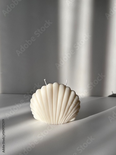 Shell candle made by hand from natural soy wax