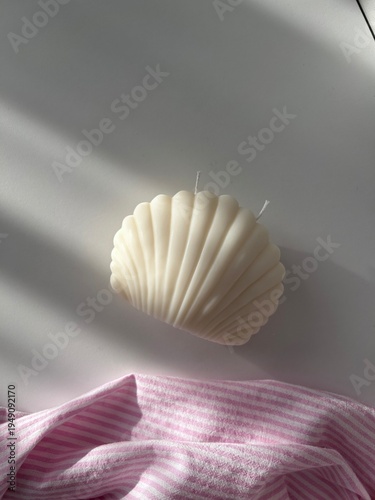 Shell candle made by hand from natural soy wax