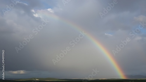 apterygote. A rainbow arching over a landscape as dark clouds part to reveal clear sky. ESG reports, sustainability campaigns, designed for environmental awareness campaigns, used by professors.