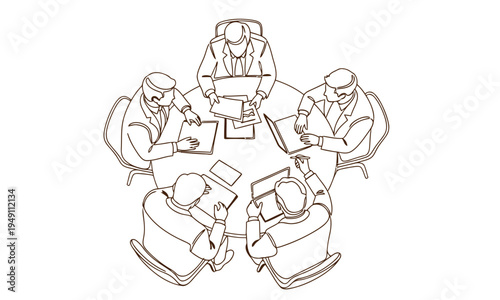 Strategic Synergy: A top-down perspective showcases a team of professionals immersed in a collaborative strategy session around a circular table, filled with laptops and paperwork.