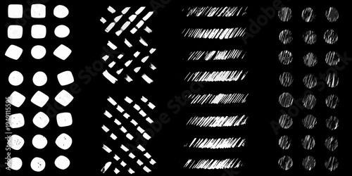 Abstract arrangement of white brushstroke shapes on a black background
