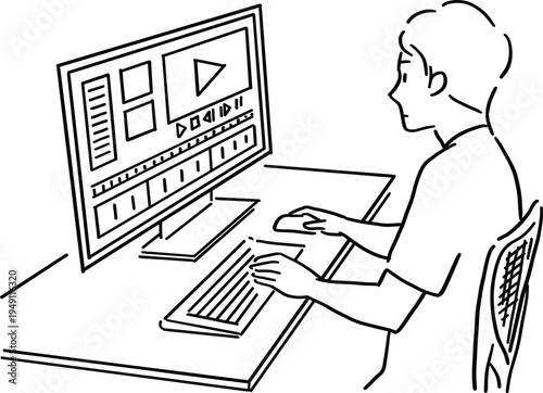 パソコンで動画編集をする男性