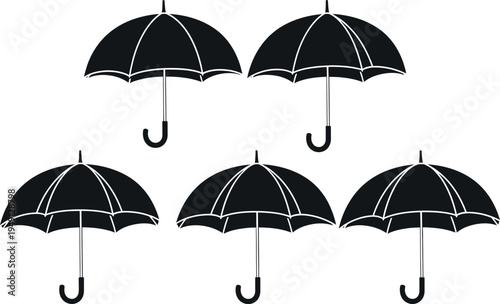 Five black classic umbrellas with white trim on a white background