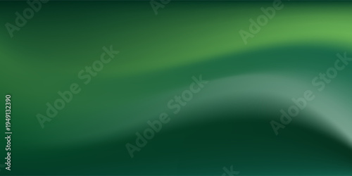 Abstract blurred gradient mesh background in green.