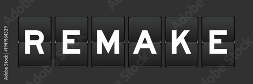 Black color analog flip board with word remake on gray background