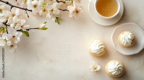 Delightful Cookies and Tea With Cherry Blossoms on a Simple Table Setup