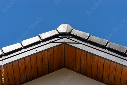 Building gable roof with pvc soffit and flashing
