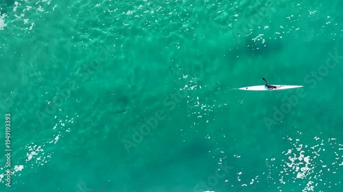 Incredible Aerial View of Kayaker Paddling Over Sharks in Crystal Clear Turquoise Water - Hadera, Israel