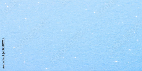 Blue Christmas background featuring a seamless vintage grunge paper texture with a light blue snow pattern on a rough aged canvas backdrop