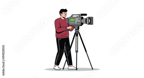A man operating a large video camera on a tripod stand