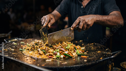 Kottu roti street food cooking at night traditional Sri Lankan street food preparation