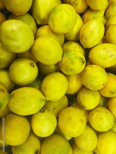 Macro close-up of juicy lemon texture, vibrant citrus background full of vitamin C, perfect for healthy eating, diet, and organic food concepts. Close-up of fresh yellow lemon texture, juicy citrus fr
