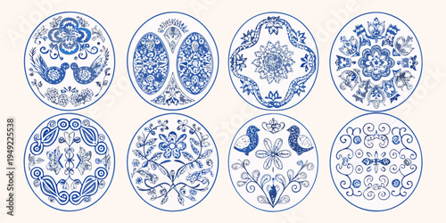 Eight blue and white decorated easter eggs in oval frames