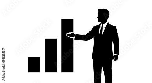 Businessman pointing at graph.