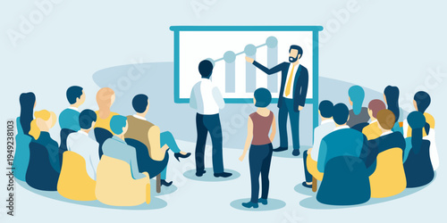 A business professional presenting to a group of attentive colleagues