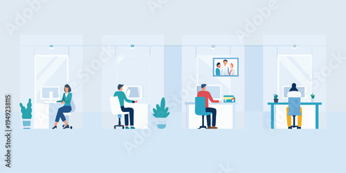 Modern office space with employees working at desks and a video call