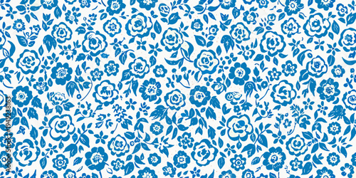 A repeating pattern of blue floral designs on a white background