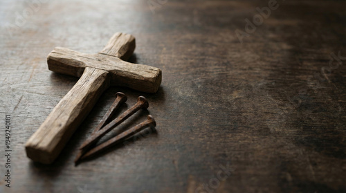 Wooden Cross and Nails on Dark Table Good Friday Crucifixion Symbol