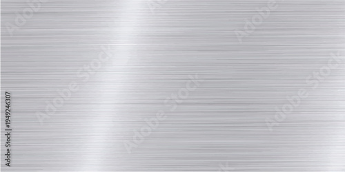 A polished stainless steel plate featuring a brushed metallic texture with a shiny silver aluminum surface and industrial grey pattern reflection on a textured titanium sheet wallpaper