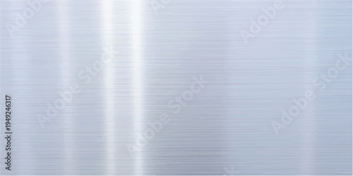 Brushed silver metal plate with a polished stainless steel texture reflecting a shiny industrial aluminum surface over an abstract blue fabric background material