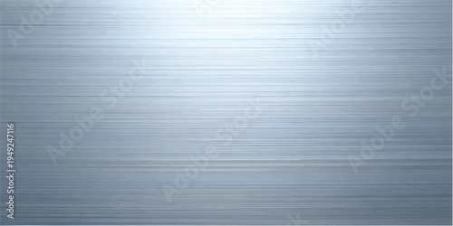 A seamless brushed metal texture features a silver metallic pattern on a polished stainless steel plate, creating an industrial gray aluminum surface backdrop for modern material design