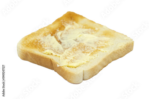 slice of toasted bread with melting butter isolated on white background for food design