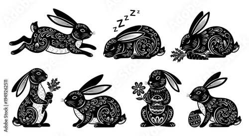 Set of black and white ornate rabbits in various poses.