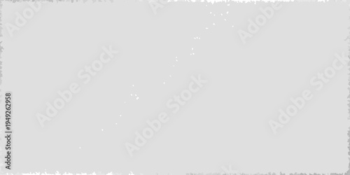Abstract gray background with scattered white noise or grain texture