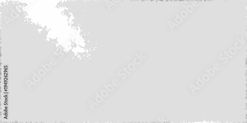Abstract gray background with a bright blurred light source