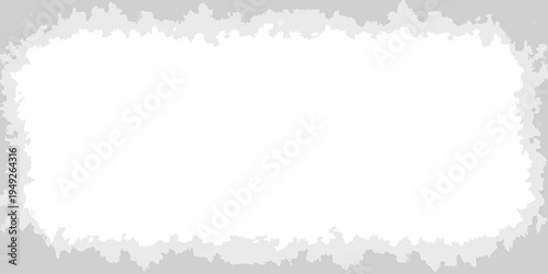 A roughly rectangular white space framed by a jagged gray border