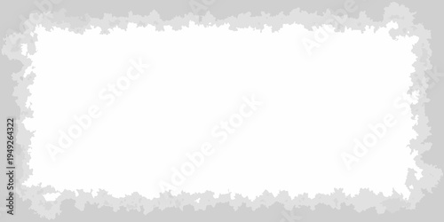 A rectangular white space framed by a jagged gray border
