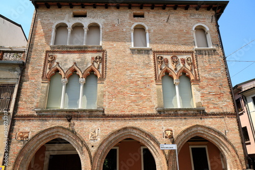 Tableau sur toile Historic Brick Building Facade with Arched Windows, Portogruaro, Italy