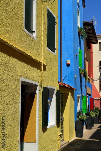 Vibrant Colorful Buildings on a Narrow Street, Caorle, Italy