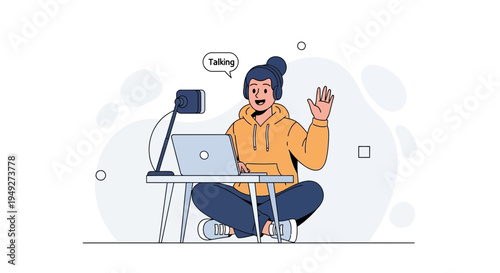 Young person with headphones and laptop, waving hello, recording content