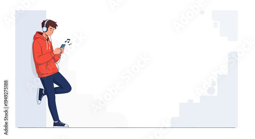 Young man listening to music on headphones and smartphone, leaning against wall